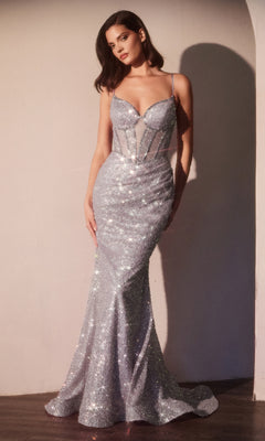 A woman stands against a wall wearing the Ladivine CC0401, a fitted, floor-length sequin prom dress with a sheer corset bodice, spaghetti straps, and a chic sweetheart neckline.