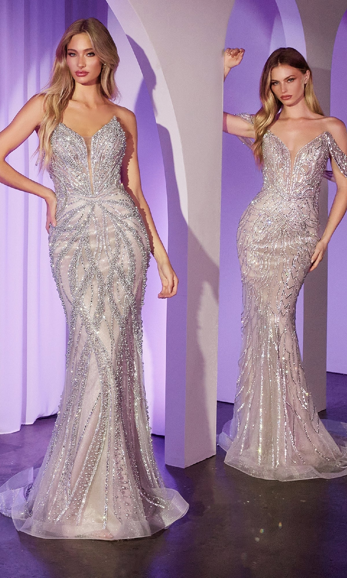 Two women pose indoors in Ladivine CC0688 Strapless Long Beaded Prom Dresses, featuring silver sequin and bead embellishments, in front of light purple curtains and arched structures.