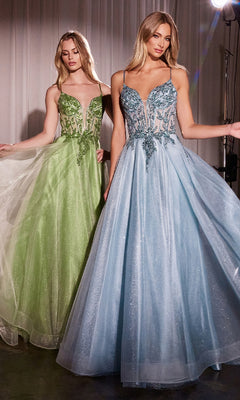 Two women stand indoors against a curtain, each wearing the Ladivine CC0881 Sheer-Corset Long Prom Dress with beaded embroidery—one in light green, the other in light blue—featuring floor-length, sleeveless designs and embellished sheer bodices.