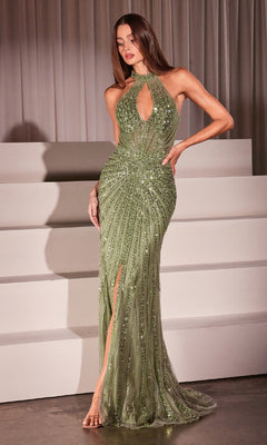 A woman in the Ladivine CC404 Cut-Out Long Beaded Prom Dress, a fitted green sequin gown with a halter neckline, keyhole cutout, and thigh-high slit, poses elegantly before white tiered steps.