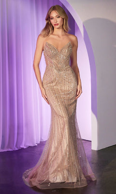 A woman stands before a purple curtain wearing the Ladivine CC416, a mocha gold strapless long sequin prom dress—a fitted, floor-length evening gown with sparkling beadwork.