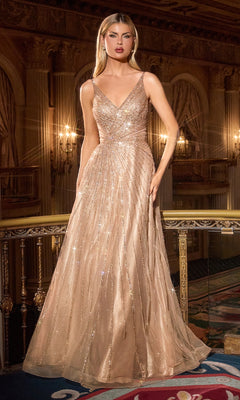 Woman in a sparkling gold evening gown in an opulent room.