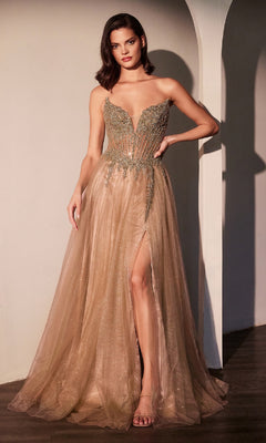 A woman stands indoors wearing the Ladivine CC487 Strapless Long Glitter Prom Dress with a beaded sheer corset bodice and high slit, posing confidently with one leg slightly forward.