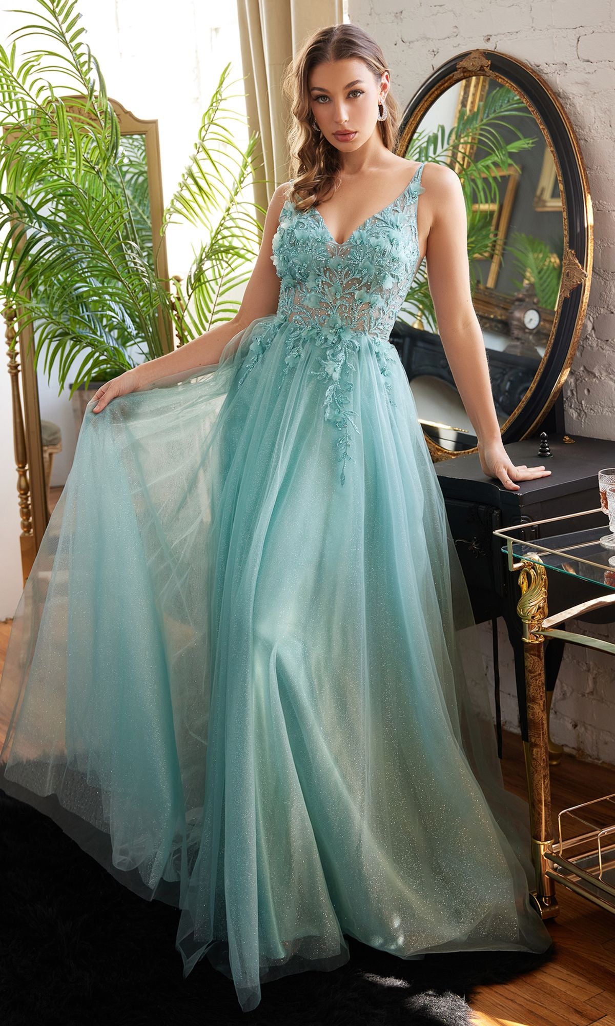 A woman in the Glitter Tulle Illusion Prom Dress, Ladivine CD0181.