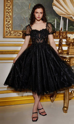 A woman in the Puff-Sleeve Tea-Length Prom Dress: CD0187, featuring black sheer fabric and floral details, stands in an ornate room adorned with gold accents and a large painting in the background.