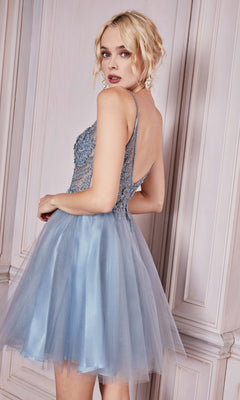 A woman models the Lace-Bodice Short A-Line Homecoming Dress CD0190 in light blue, featuring a sleeveless tulle skirt and sheer lace bodice, as she stands sideways and looks over her shoulder in an elegant paneled room.