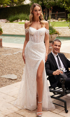 A woman in the Long White Off-Shoulder Sequin Prom Dress CD0203W with a thigh-high slit stands by the poolside, while a man in a dark suit sits nearby holding a glass.