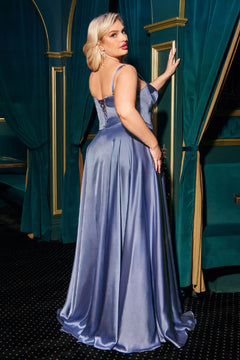 A woman in the Plus-Size Long A-Line Prom Dress Ladivine CD337C stands with her back to the camera in an elegant, teal room.
