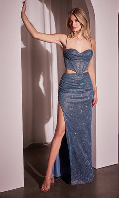 A woman stands in a doorway wearing the Ladivine CD350, a two-piece long glitter prom dress with thin straps, structured bodice, cutout waist, and high slit, looking to the side to showcase its dazzling shimmer and elegant silhouette.