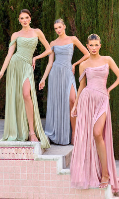 Three women pose on outdoor steps in pastel green, blue, and pink Ladivine CD409 long prom dresses with pleated chiffon fabric, high slits, and asymmetrical necklines. Lush trees provide a scenic backdrop.