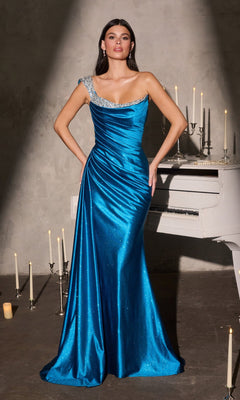 A woman in the Ladivine CD420 long prom dress in teal stands by a white piano, surrounded by lit candles and a gray textured wall.