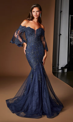 A woman models the Ladivine CD659 Long Formal Dress in navy, featuring off-shoulder embellished details, sheer flared sleeves, and a mermaid silhouette against a plain brown studio background.