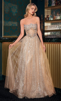 Woman wearing a sparkling gold evening gown in an elegant indoor setting.