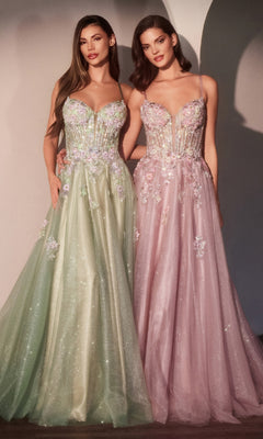 Two women stand side by side in the Ladivine CD740 long glitter-tulle prom dress—one in light green, one in light pink—both with spaghetti straps, beaded floral appliques, and sparkling overlays for an enchanting look.