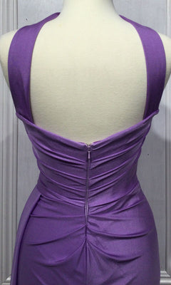 A close-up of the back of a mannequin wearing the Choker Long Prom Dress with Gloves CD886, a sleeveless purple ruched evening gown featuring a zipper closure.