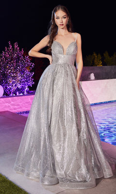 A woman wearing the Corset-Back Long Glitter Prom Ball Gown CD996 stands by a pool at night, with illuminated trees and shrubs in the background.
