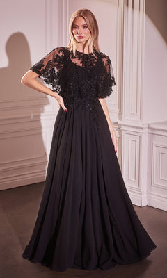 Woman wearing the Beaded-Cape Long Formal Dress (CLCDS503) in black, featuring glitter embroidery, sheer lace short sleeves, and delicate details, standing indoors against a white paneled wall.
