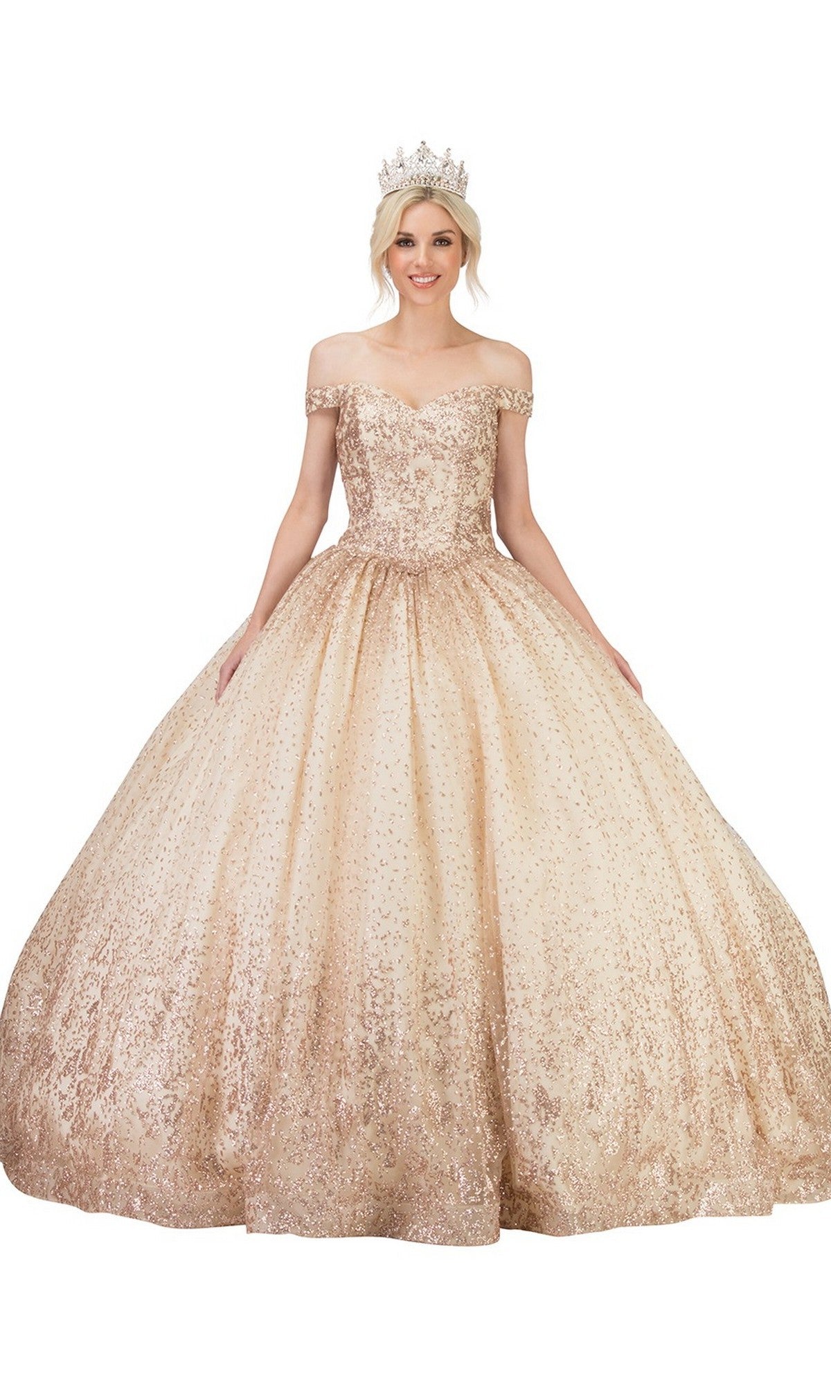 A woman stands with her arms slightly extended, showcasing the full ballgown skirt of the Quinceanera Dress CHF3001 By Chicas in shimmering gold, featuring an off-the-shoulder design with sparkling metallic embroidery and a jeweled crown.
