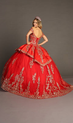 A woman wearing the Quinceanera Dress CHF3052 By Chicas—a red gown with gold embroidery and a tiara—stands on a gray backdrop, facing away and looking over her shoulder.