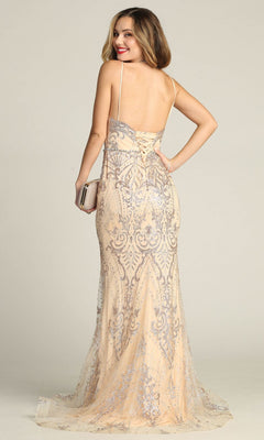 A woman in the Chicas CHF3053 Lace-Up Long Glitter Prom Dress stands against a plain background, holding a small clutch and looking over her shoulder.