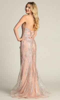 A woman stands facing away from the camera in the Lace-Up Long Glitter Prom Dress: Chicas CHF3053, a floor-length, light pink sequin gown with spaghetti straps and a lace-up back.
