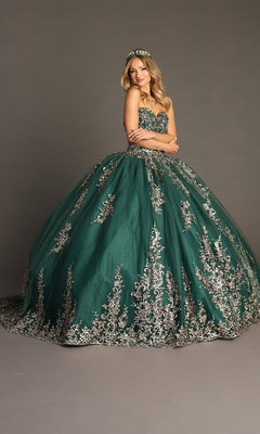 A woman wearing the Quinceanera Dress CHF3073 By Chicas in dark green, featuring a strapless design with a glitter-tulle skirt and metallic-silver embroidery, complemented by a matching tiara, stands against a plain gray background with her arms crossed.