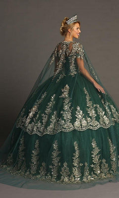 A woman in the Quinceanera Dress CHF3083 by Chicas—a green ballgown accented with silver embroidery and shimmering glitter tulle—wears a tiara as she stands facing away from the camera against a plain background.