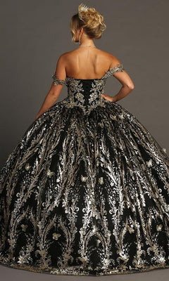A woman stands facing away from the camera against a plain background, wearing the Quinceanera Dress CHF3101 By Chicas—an elaborate black ball gown adorned with metallic-silver embellishments and topped with a tiara.