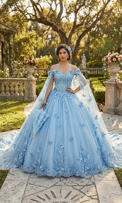 A woman in the Quinceanera Dress CHF3121 By Chicas, a sky blue off-the-shoulder ball gown with delicate floral details and a matching parasol, stands on a stone patio in a garden adorned with statues and flowers.