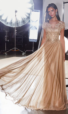 A woman stands in a studio lit by professional lights, wearing the Ladivine CL11 long formal dress featuring a beaded embellished bodice.