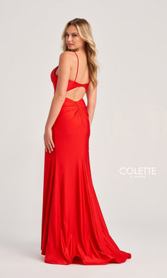 Woman wearing the Corset-Bodice Long Colette Tight Prom Dress CL5111 in red, a floor-length formal gown with thin straps and open back, posing and glancing over her shoulder against a light background.