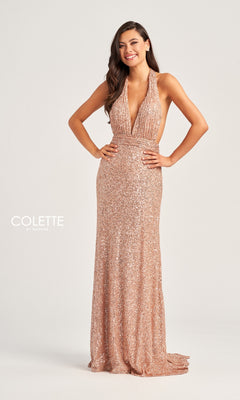 A woman confidently poses in the Colette Long Sequin Halter Prom Dress CL5115—a sleeveless, floor-length rose gold sequin gown with a deep V-neckline—set against a plain background.