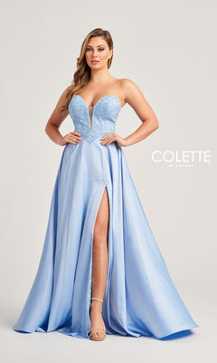 A woman models the Colette Strapless Long Designer Prom Dress CL5142, featuring a light blue hue, sweetheart neckline, lace bodice, and high leg slit, standing against a plain background.