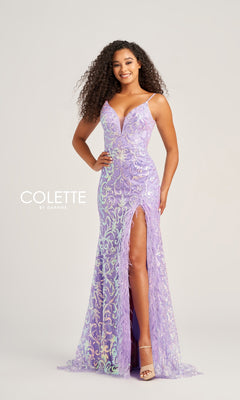 A woman stands smiling against a plain background, wearing the Feather-Sequin Colette Long Prom Dress CL5155—a sleeveless lilac gown with sequins, a high slit, and feather details.