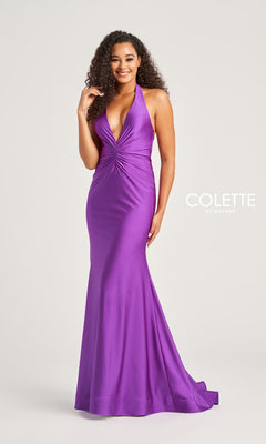 A woman models the Colette Front-Knot Long Halter Prom Dress CL5199, a sleeveless, floor-length stretch spandex jersey gown in purple with a gathered front detail, highlighting its figure-flattering silhouette against a plain backdrop.