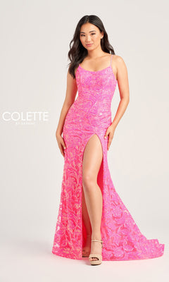 A woman wears the Colette Long Sequin Prom Dress CL5264 with gloves, featuring a bright pink hue, sleeveless design, high slit, strappy heels, and minimal accessories against a plain light background.