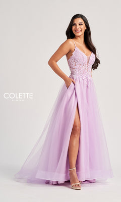 A woman smiles in the Long Prom Dress: Colette CL8100, featuring a pastel hue, lace-embroidered bodice, thin straps, tulle skirt, and thigh-high slit. The "Colette by Daphne" logo is displayed.