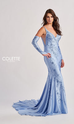 A woman models the Colette CL8475 Long Prom Dress in light blue, a fitted mermaid gown with a train, matching gloves, floral embroidery, sequins, and a deep V-neckline. "Colette by Daphne" appears on the left.