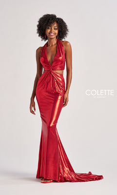 A woman wears the Colette CL8505, a long shiny red halter prom dress with a gathered waist, floor-length mermaid skirt, and elegant open back, standing against a plain background.
