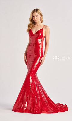 A woman in a sleeveless, form-fitting Colette CL8615 long prom dress with sequins and thin straps stands against a plain light background.