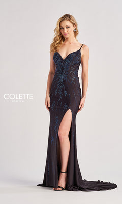 A woman stands against a plain background wearing the Colette CL8620, a floor-length prom dress featuring beaded sequins, blue embellishments, a deep V-neckline, thin straps, and a thigh-high slit.