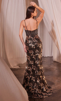 A woman stands with her back to the camera, wearing the Ladivine CM358 Gold-Trimmed Long Black Prom Dress with metallic sequin embellishments and thin straps, surrounded by draped white curtains.
