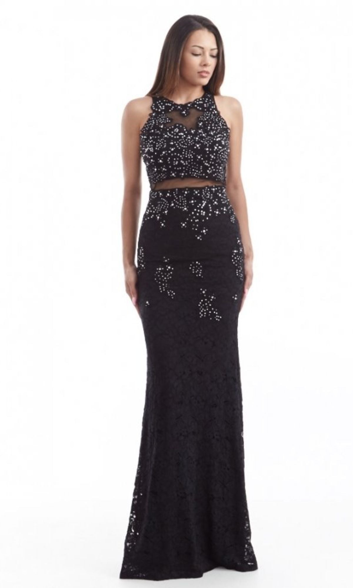 Woman wearing the Mock Two-Piece Long Lace Prom Dress: Chicas CR4225, a sleeveless, floor-length mermaid gown with sequin embellishments, standing against a plain white background.