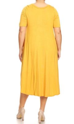 A person is shown from the back wearing the Plus-Size Jersey Knit Oversized A-Line Casual Dress in yellow with beige heels, set against a white background.