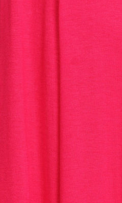 A close-up of bright pink, textured fabric with a vertical fold from the Short Sleeve Casual Oversized Jersey Knit Dress.