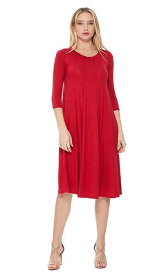 A woman models the Knee-Length Casual Party Dress—red, A-line, with three-quarter sleeves—paired with beige high-heeled sandals, standing against a white background.