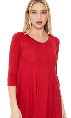 A woman with long blonde hair models the Knee-Length Casual Party Dress in red, standing and facing the camera against a white background.