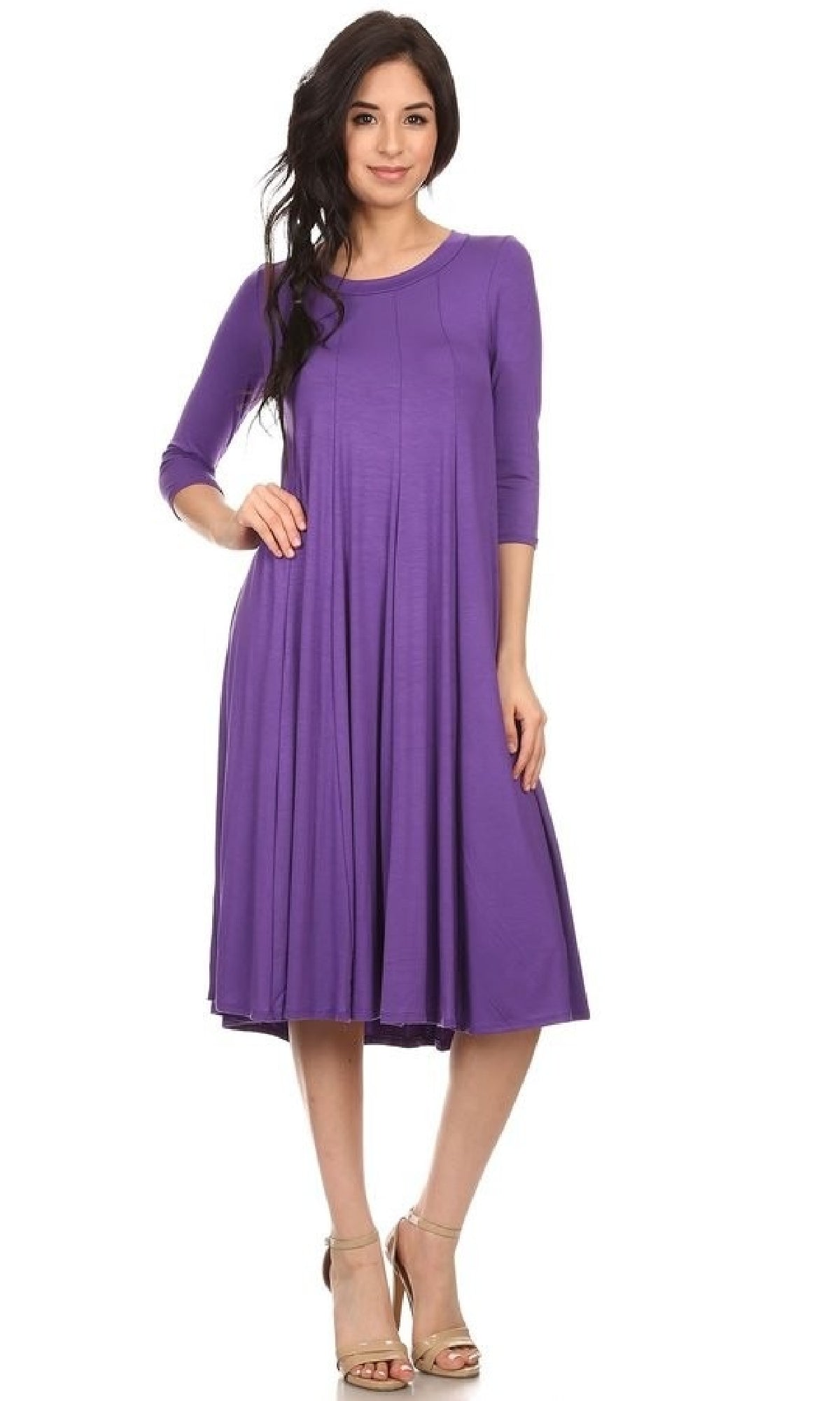 A woman stands against a white background wearing the Knee-Length Casual Party Dress with long sleeves and beige high-heeled sandals.