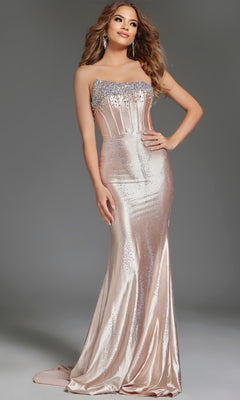 A woman poses against a plain grey background in the Jovani D5100, a strapless, form-fitting champagne long prom dress featuring sequin embellishments and a corset bodice.