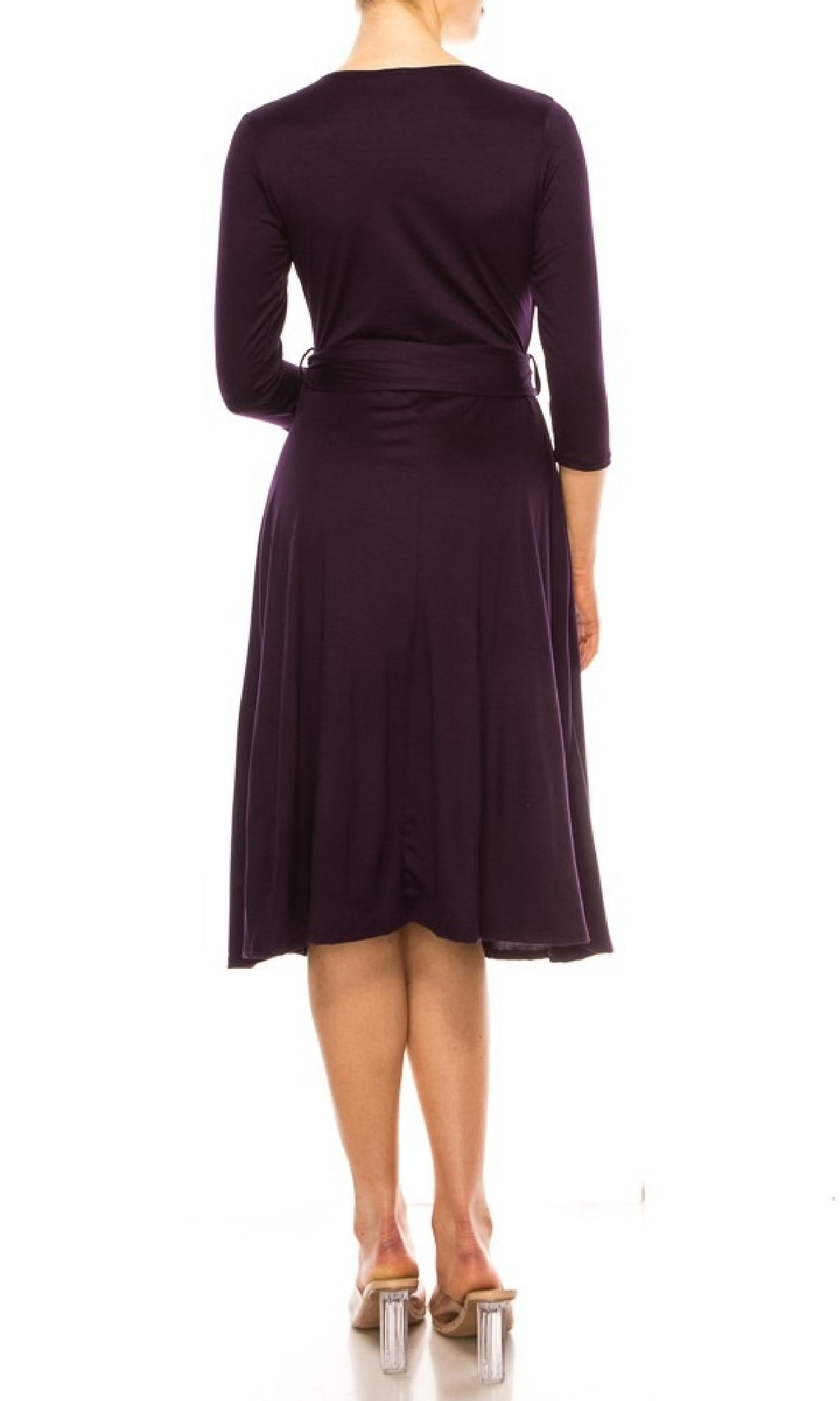 A person is shown from the back against a white background wearing the Faux-Wrap Casual Short Dress with Sleeves in purple and clear-heeled shoes.